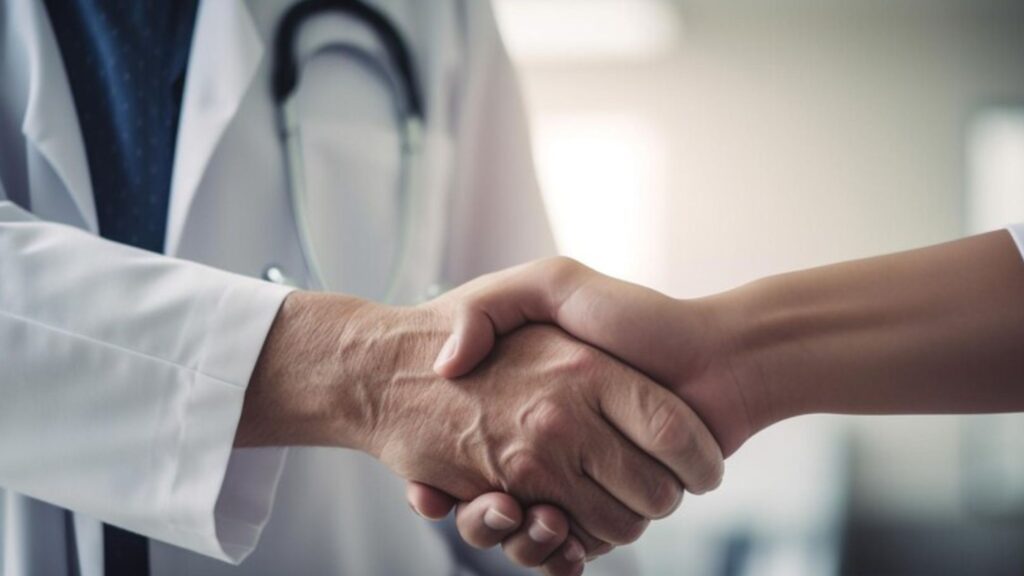 A doctor & a patient busy in early diagnosing & treating health issues