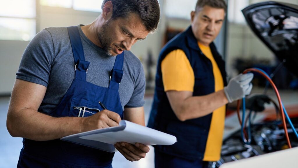 Mechanic doing diesel injector testing