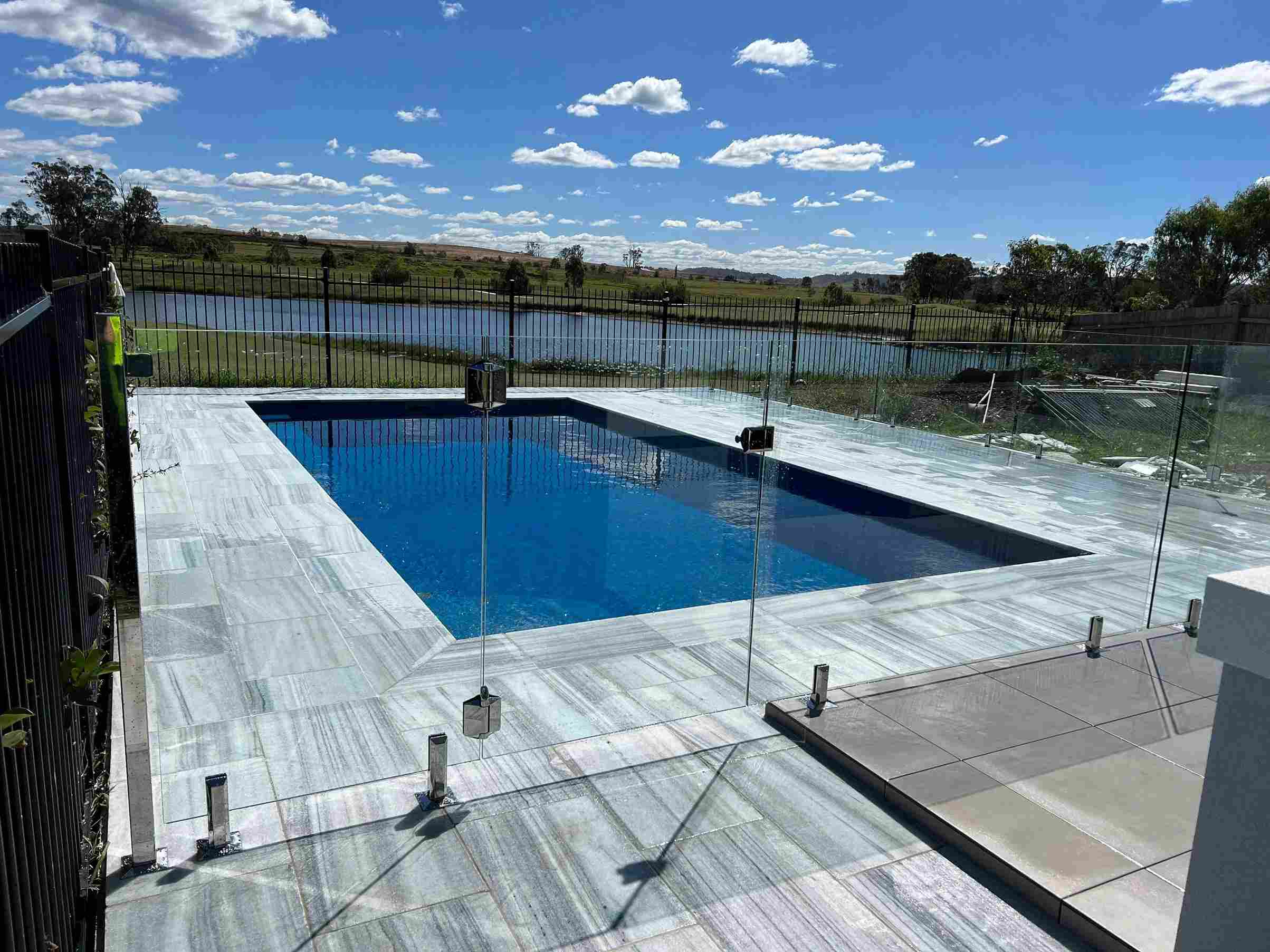 Here’s Why Using Natural Stone Pool Pavers is a Good Idea for Your Swimming Pool